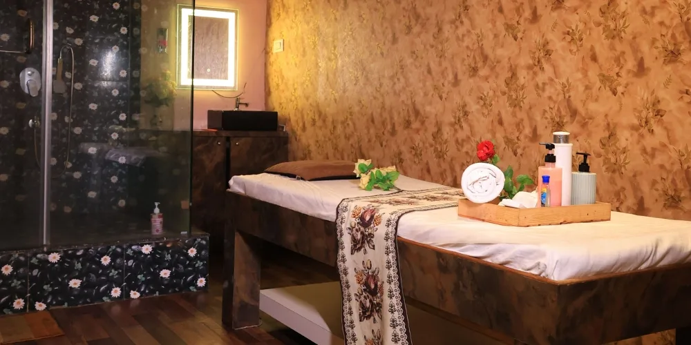 Private massage room with attached shower at Zeel Spa Powai